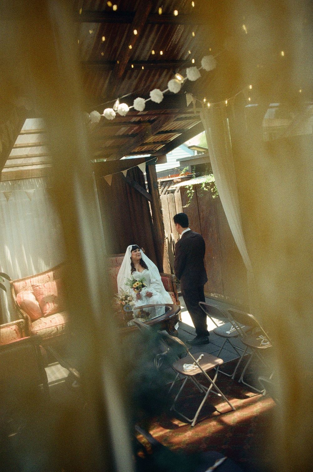 film wedding photography image of candid moment between bride and groom