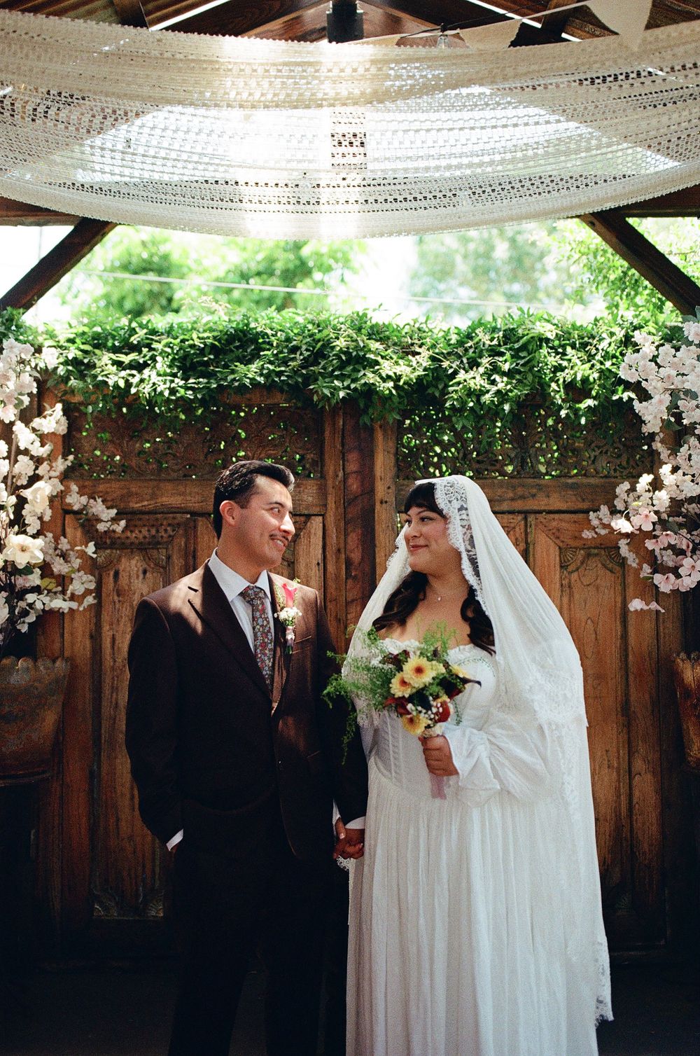 film wedding photography photo of bride and groom looking at each other
