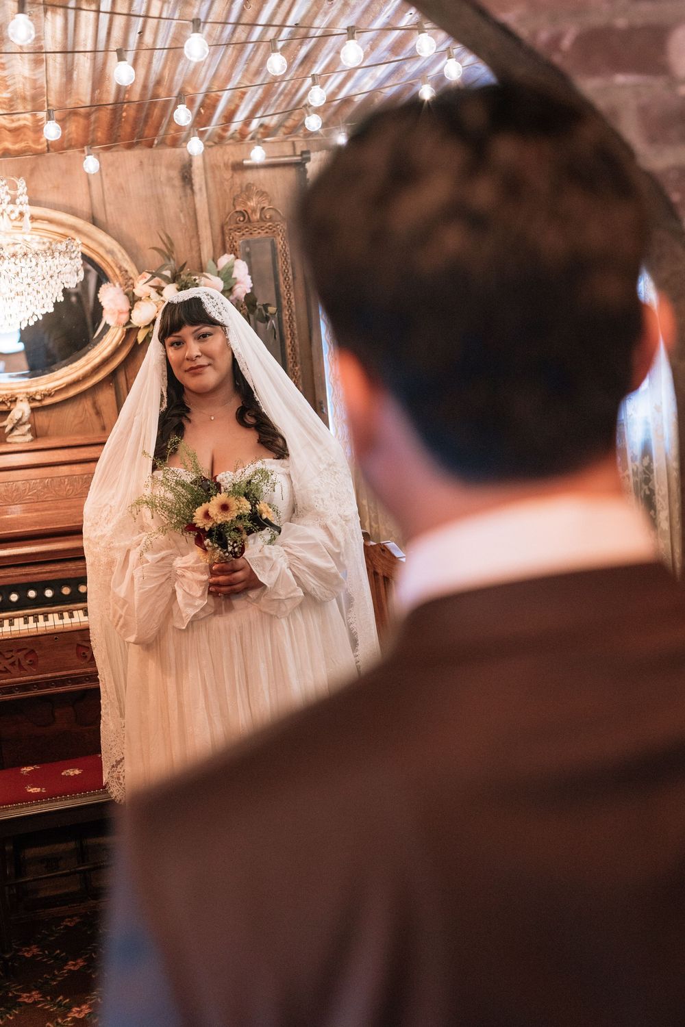 film wedding photography picture of bride looking at groom prior to the wedding