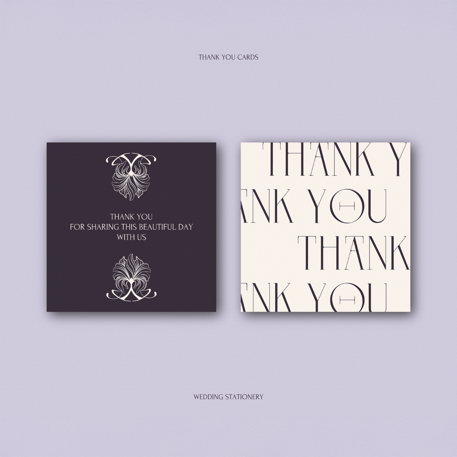 Elegant purple and cream wedding thank you cards with ornate floral monogram design.