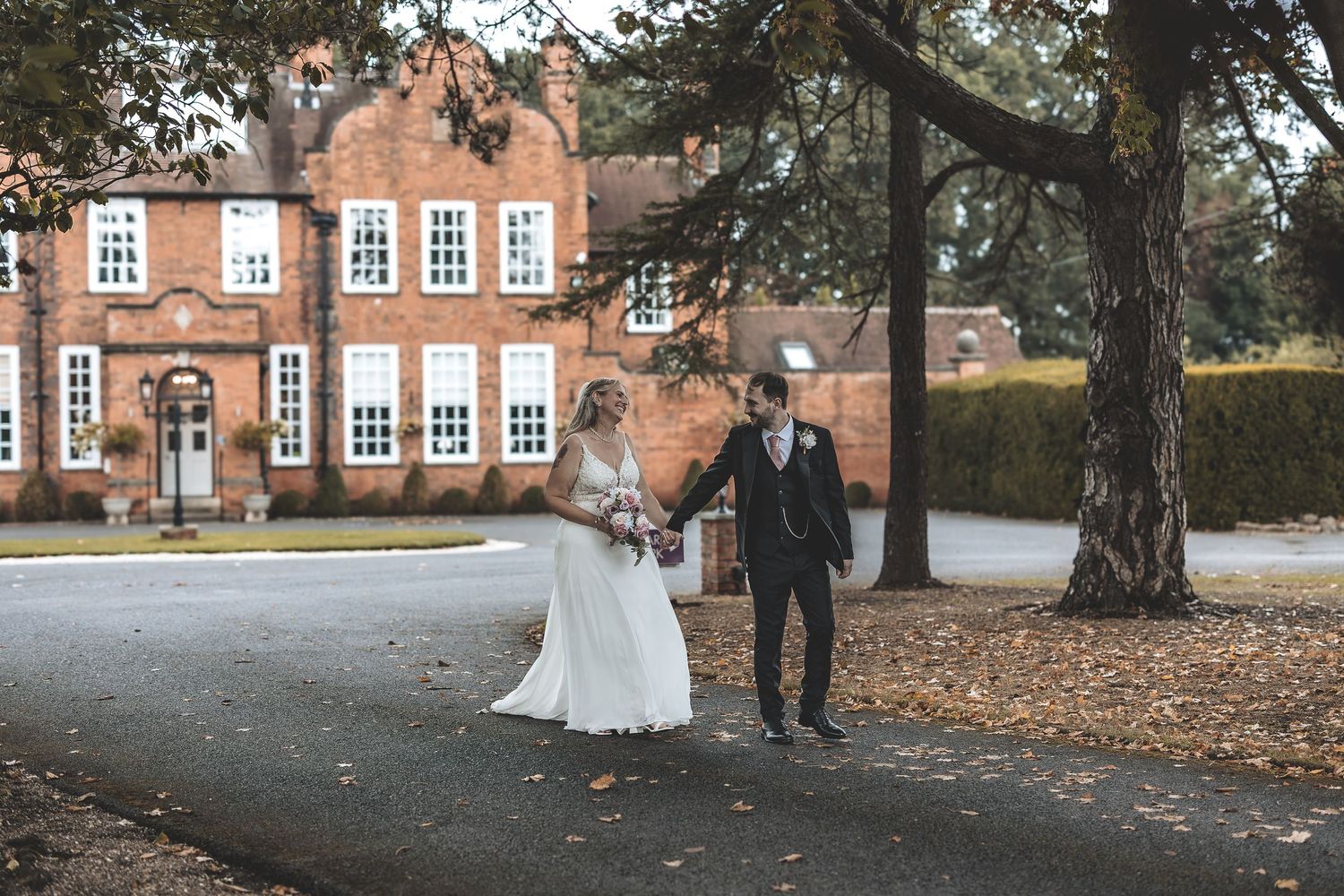 A simple prompted couple wedding photo taken at Kelham House
