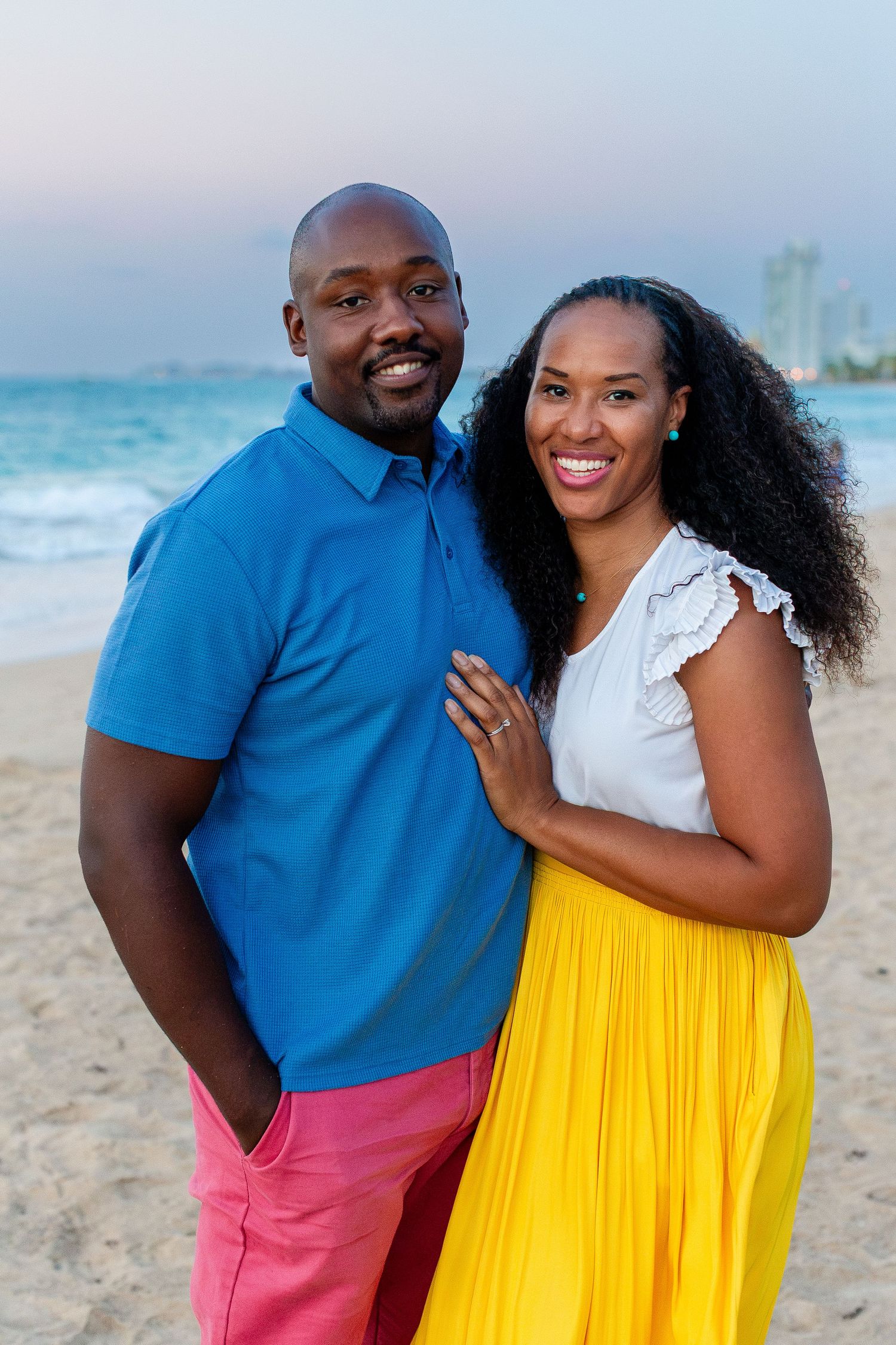 Couples portrait on the beach in Isla Verde, Carolina, Puerto Rico.