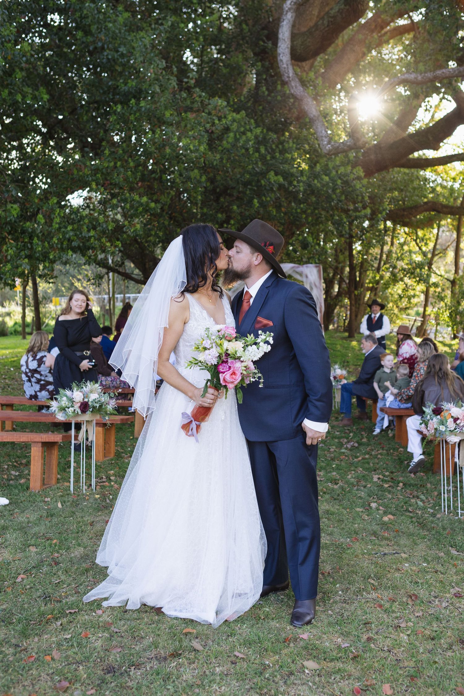 Kylie and Jono’s wedding ceremony beneath an oak tree at Moonan Cottage near Scone NSW