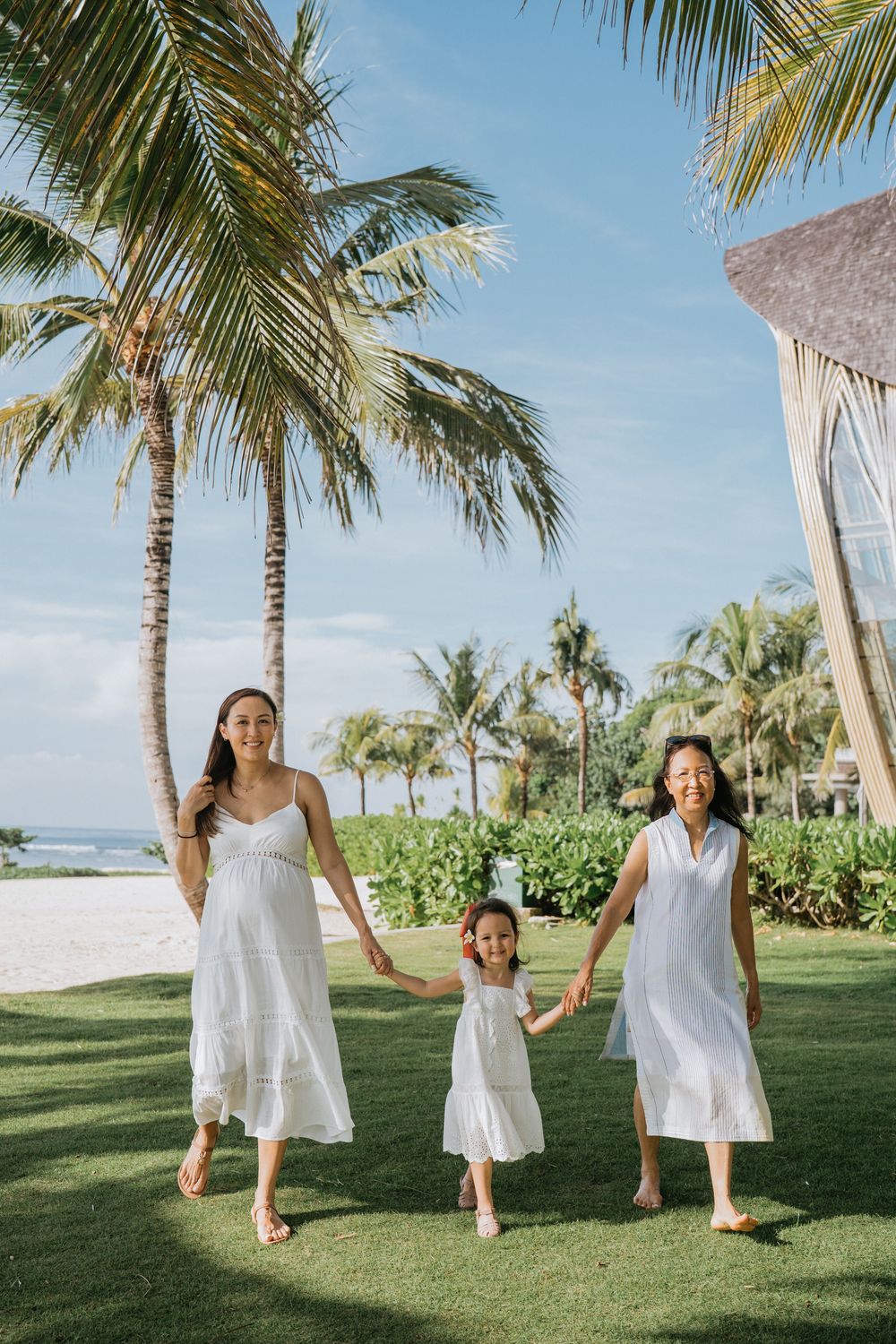 Luxury family photography session at The Apurva Kempinski Bali resort.