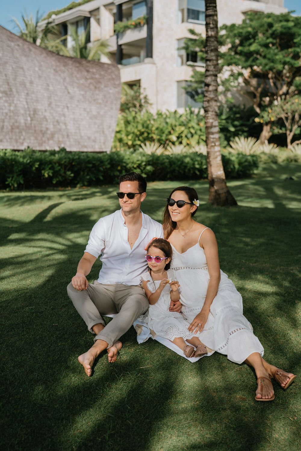 Luxury family photography session at The Apurva Kempinski Bali resort.