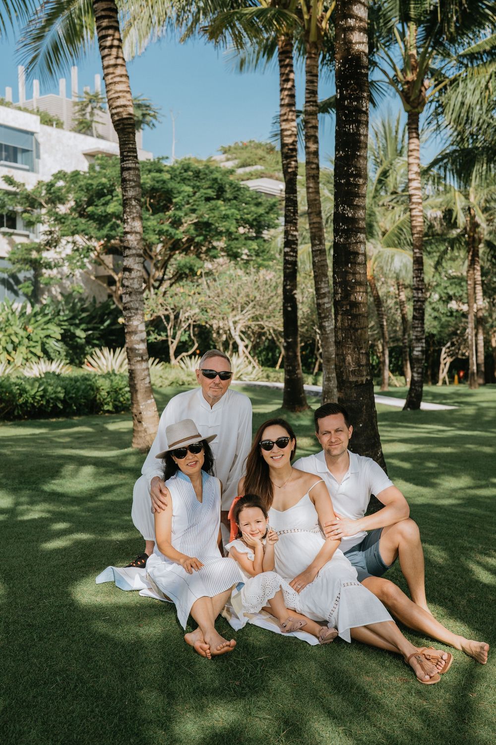 Luxury family photography session at The Apurva Kempinski Bali resort.