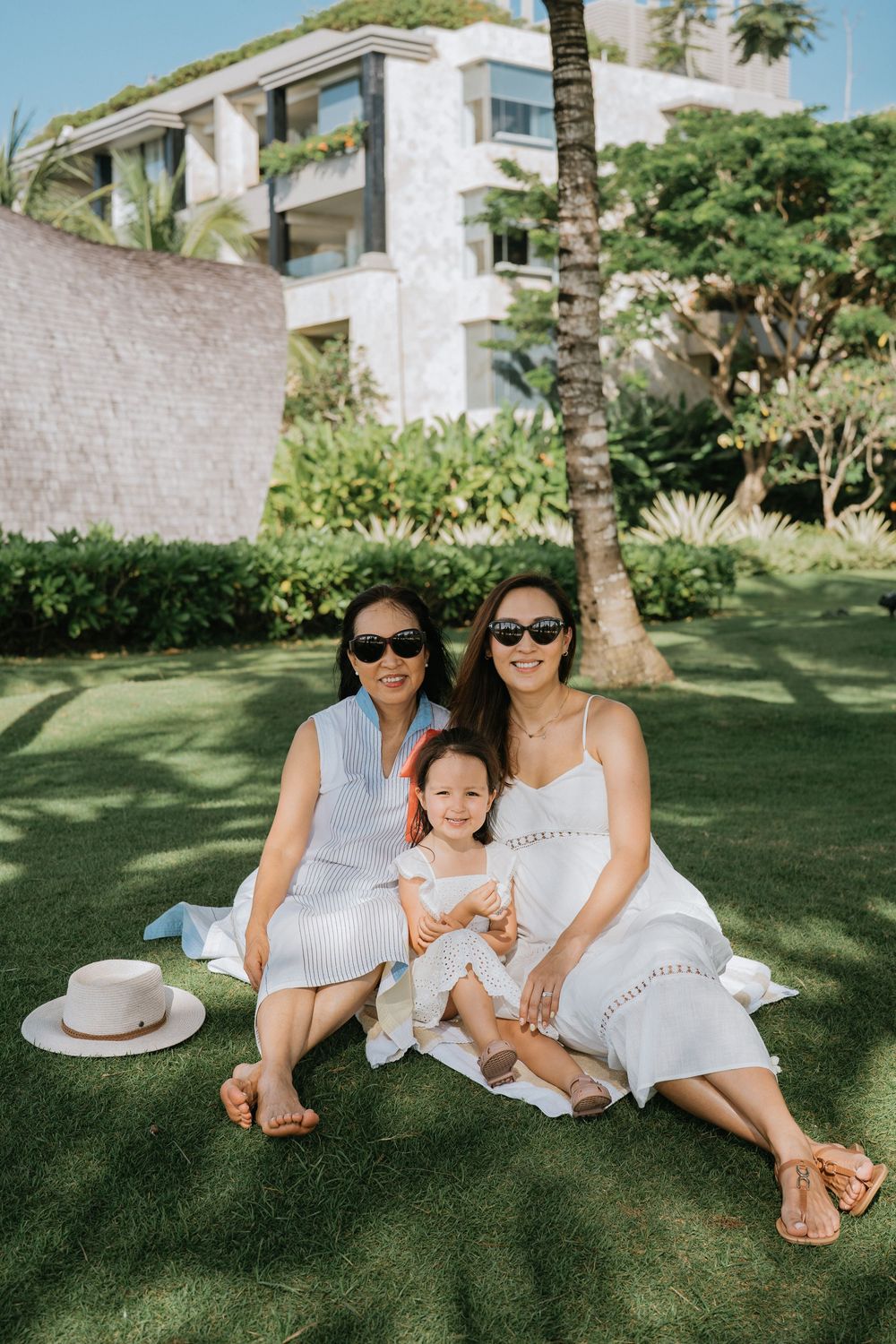 Luxury family photography session at The Apurva Kempinski Bali resort.