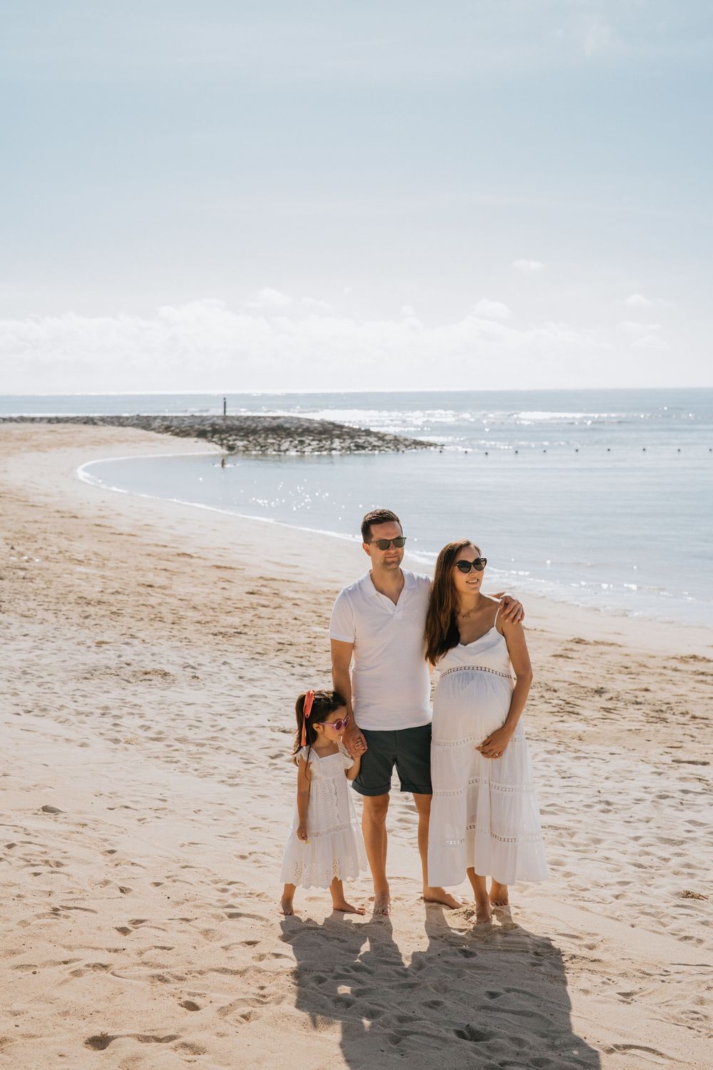 Professional family photographer capturing moments at The Apurva Kempinski Bali.