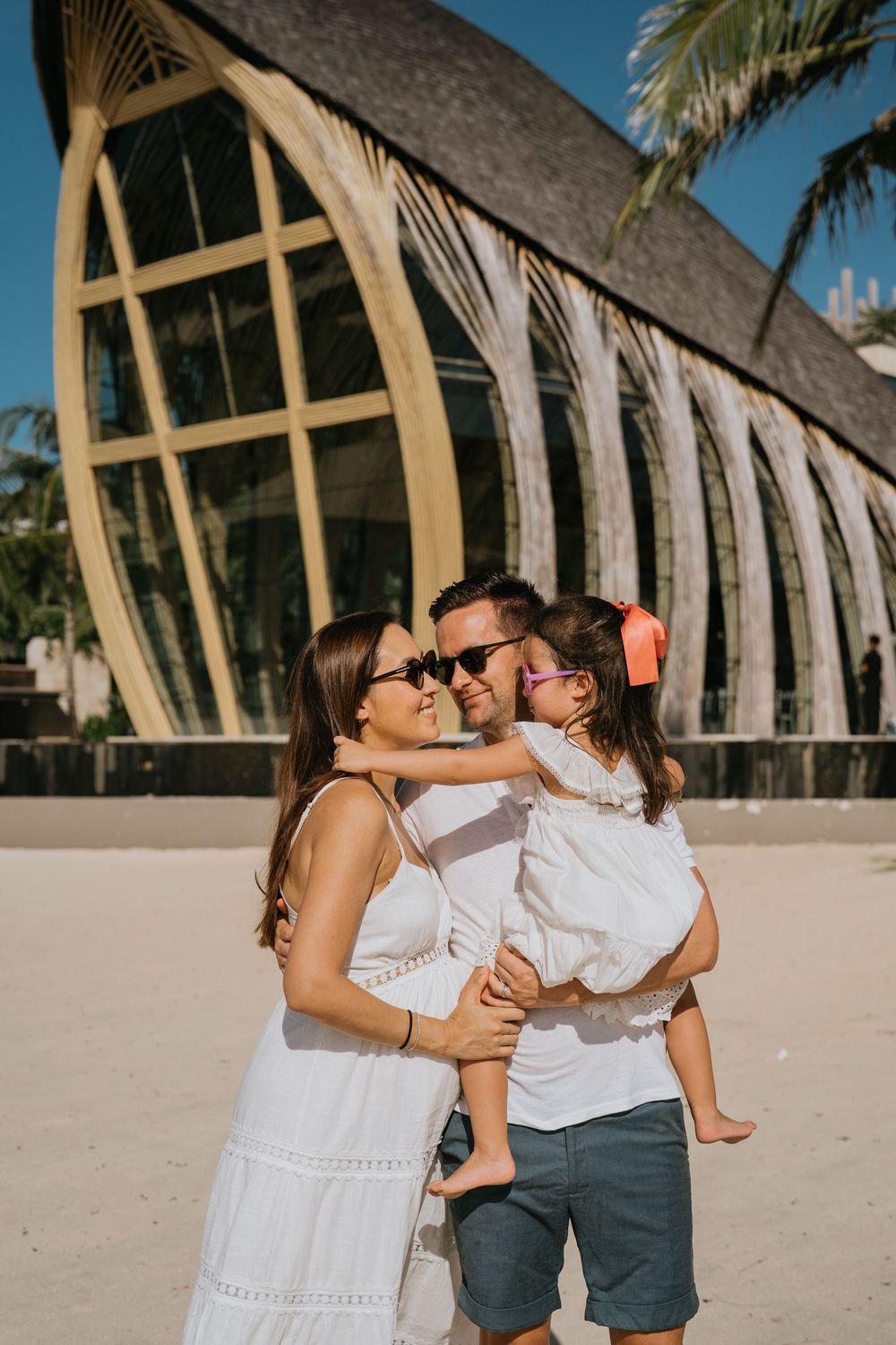 Professional family photographer capturing moments at The Apurva Kempinski Bali.