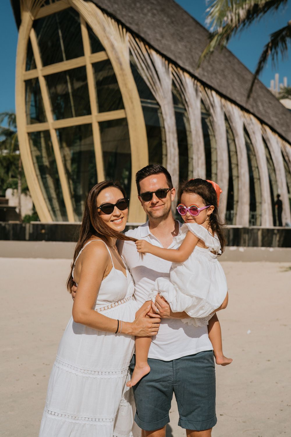 Professional family photographer capturing moments at The Apurva Kempinski Bali.