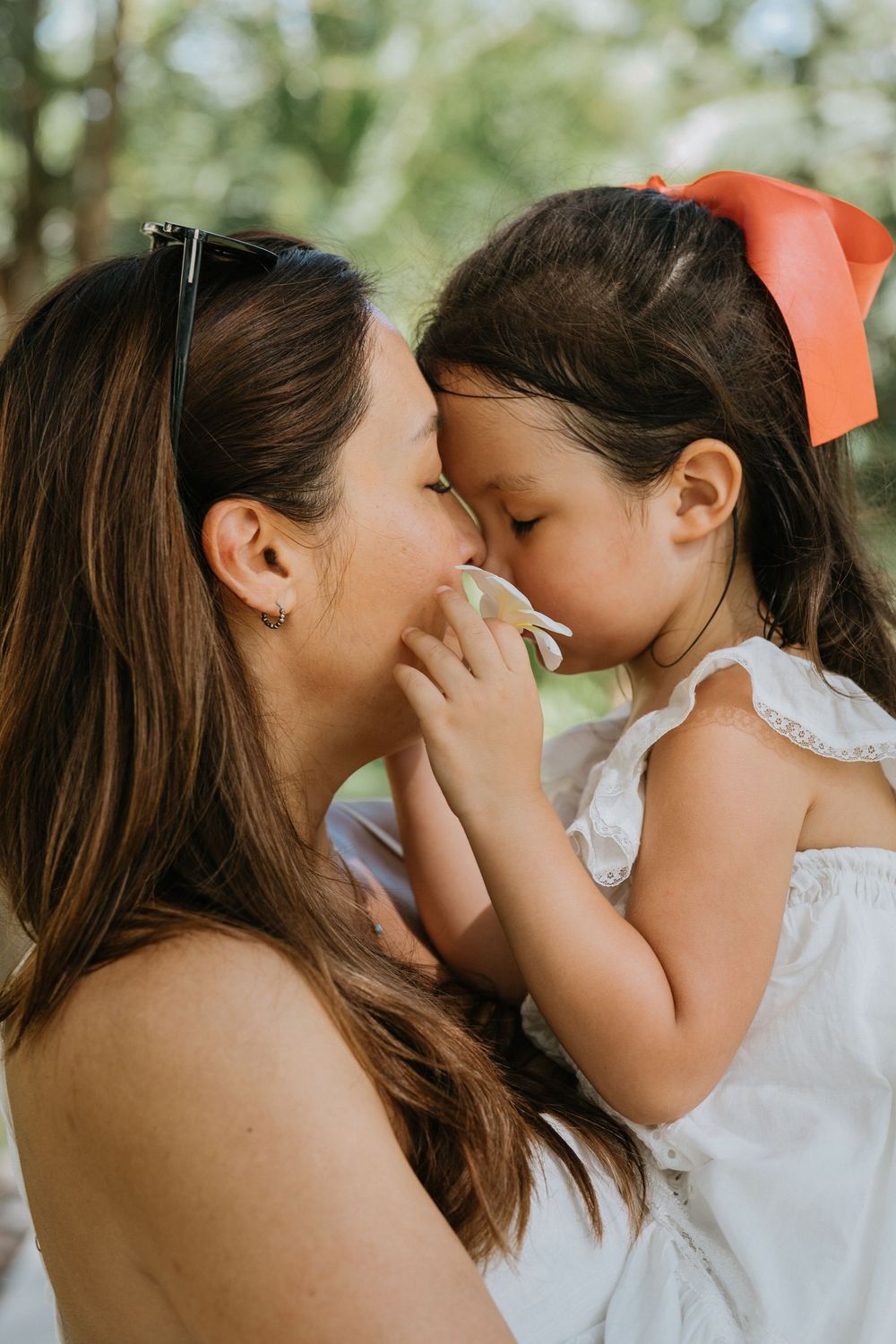 Professional family photographer capturing moments at The Apurva Kempinski Bali.