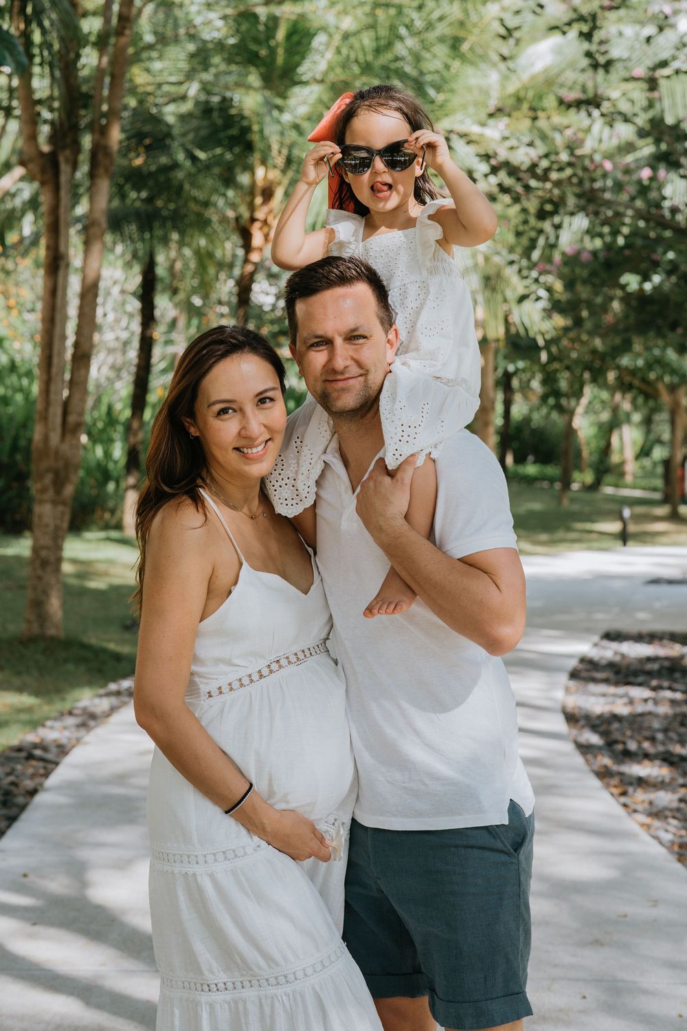 Professional family photographer capturing moments at The Apurva Kempinski Bali.