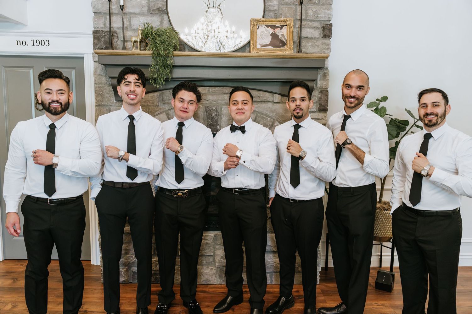 Paul and his groomsmen posing together before the wedding