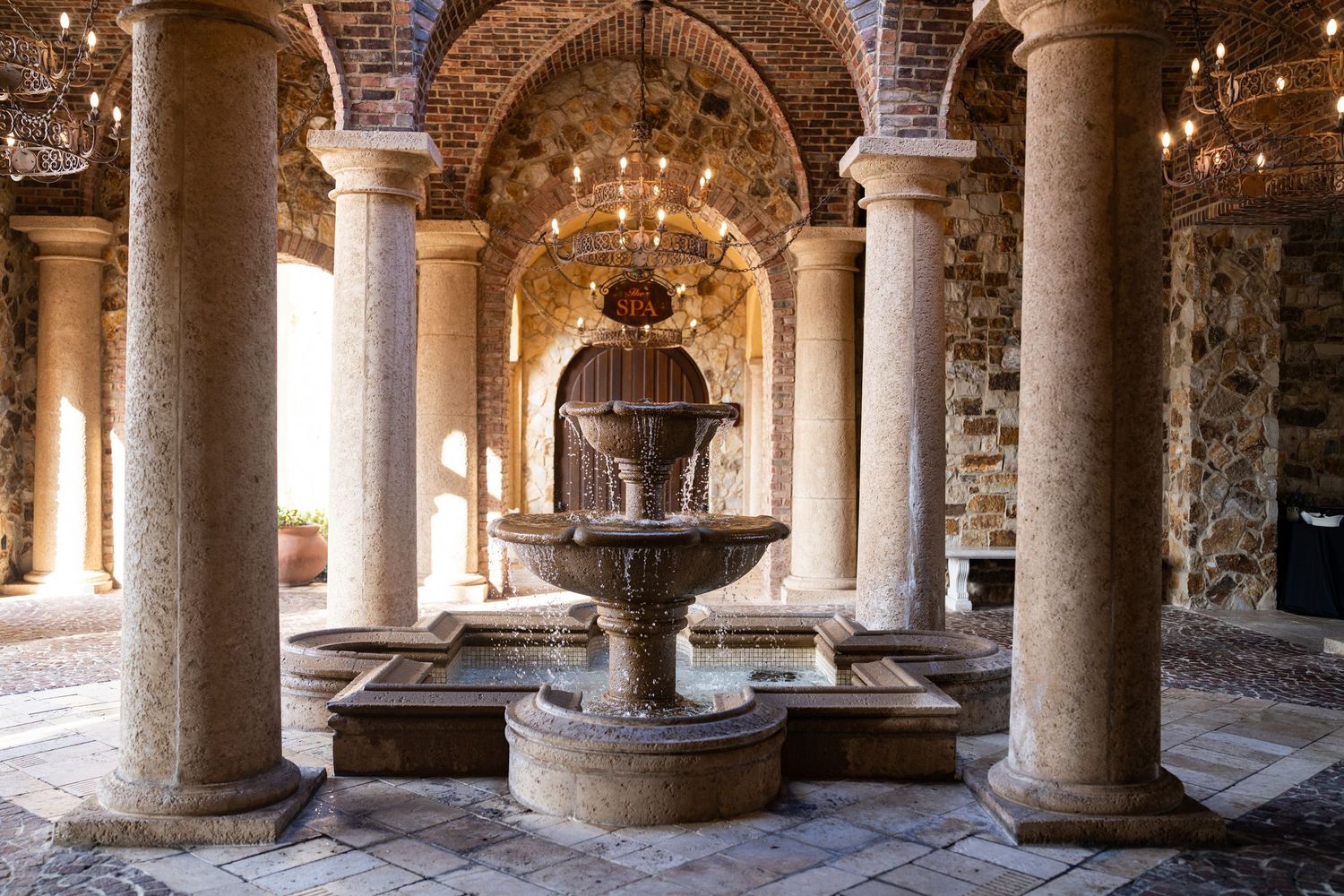 Bella Collina fountain courtyard columns wedding venue Montverde Florida Weddings by Ray