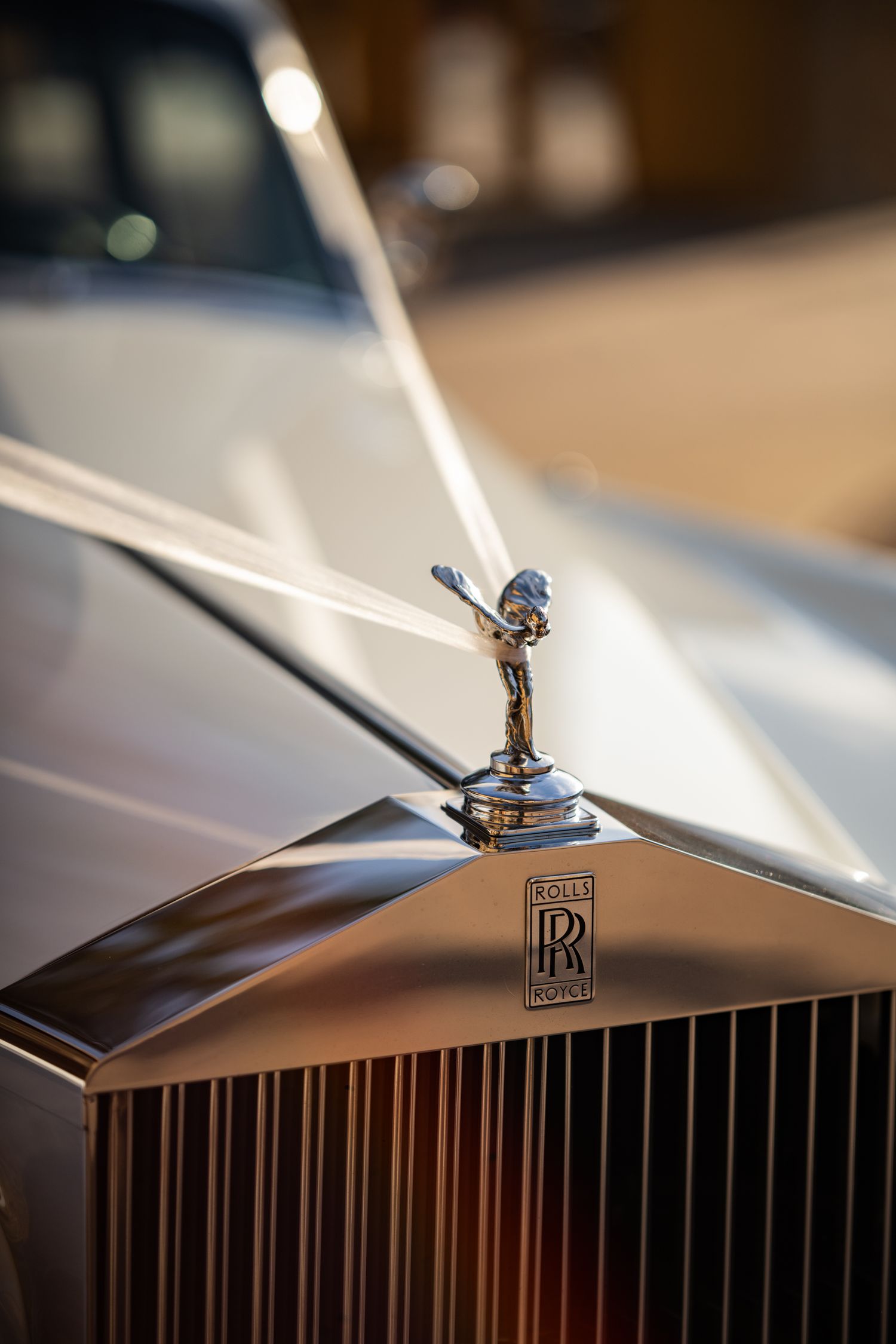 Rolls Royce hood ornament detail wedding photography Bella Collina Florida Weddings by Ray