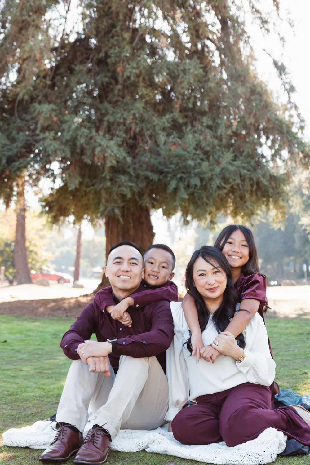 family picnic photoshoot in Fresno Woodward park for holiday postcard