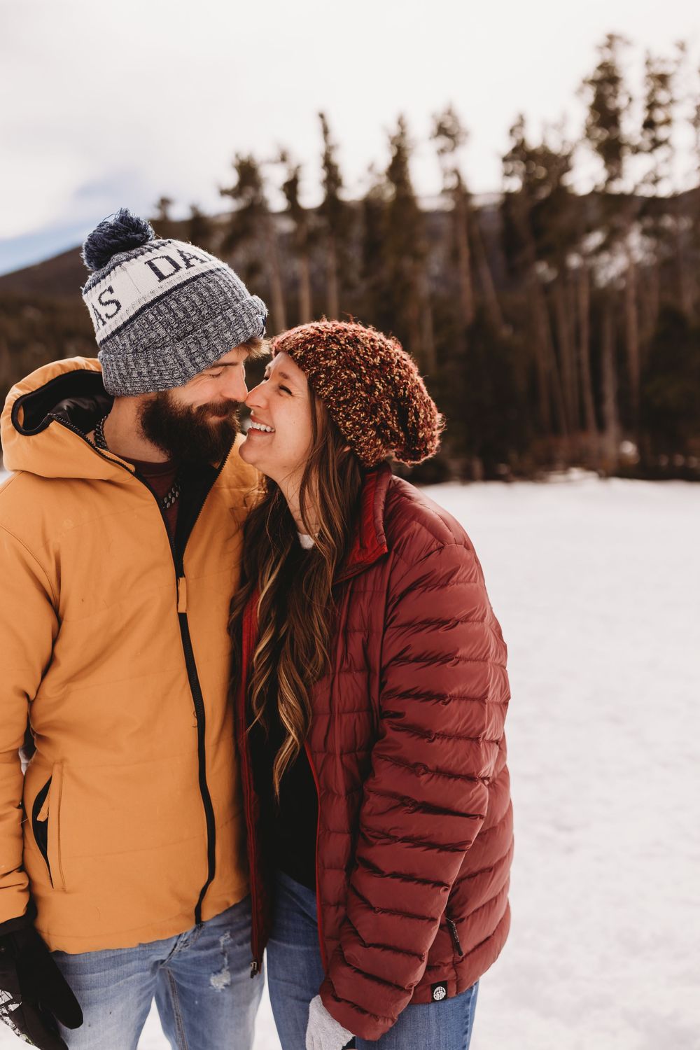 colorado hiking mountains  couple smiles golden sun