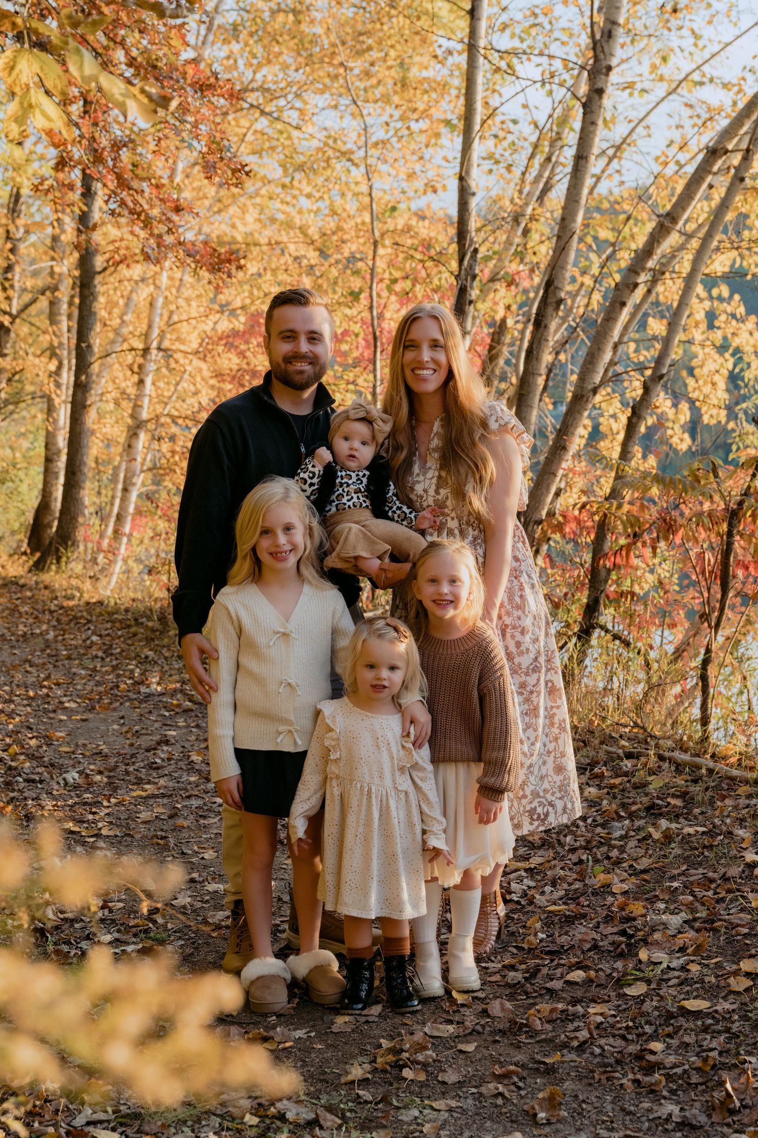 family session on the dock during the fall in Hudson Wisconsin