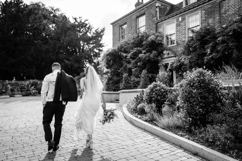 bride and groom candid wedding photography in kent at the vines of rochester