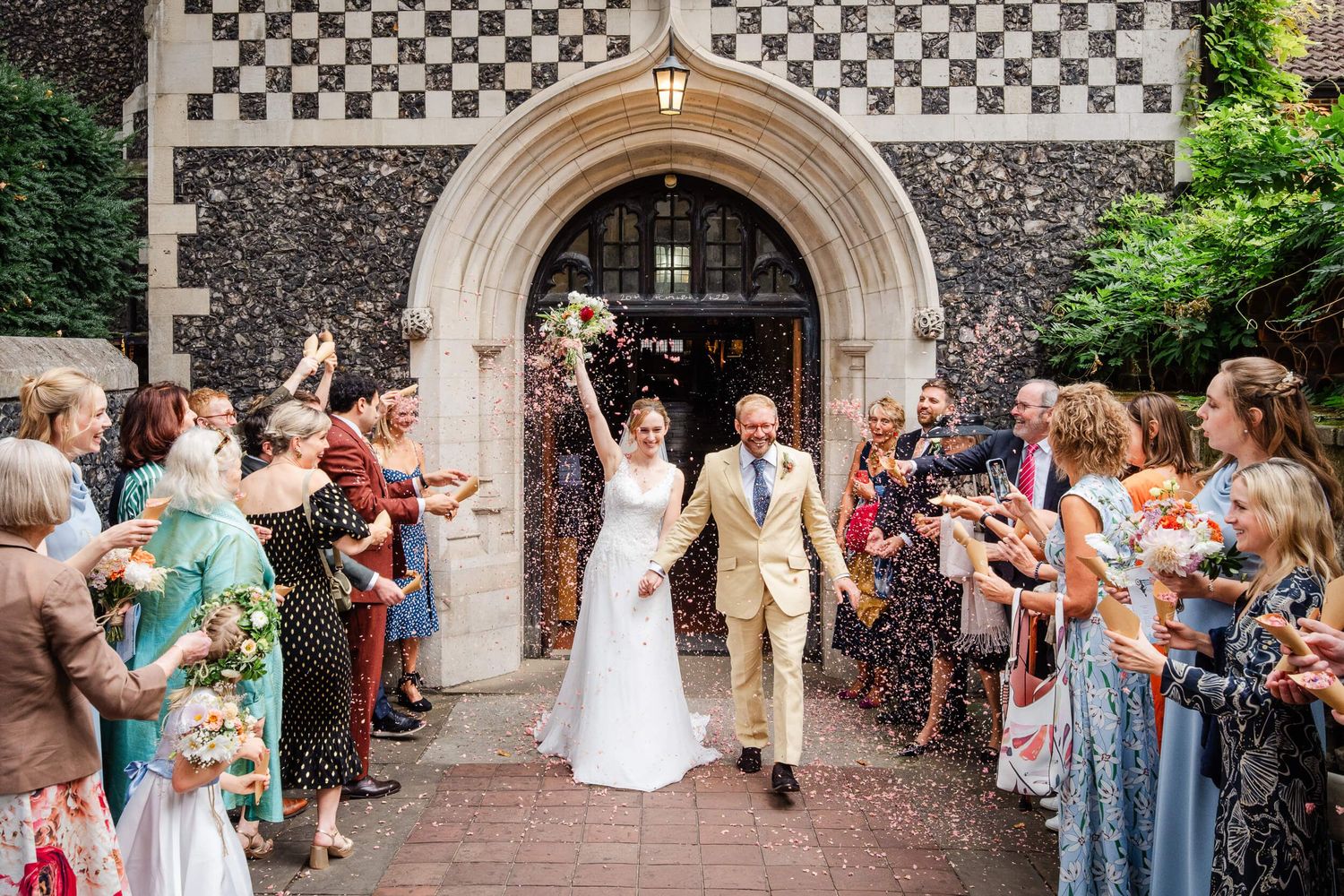 wedding at a church during confetti outside the church wedding