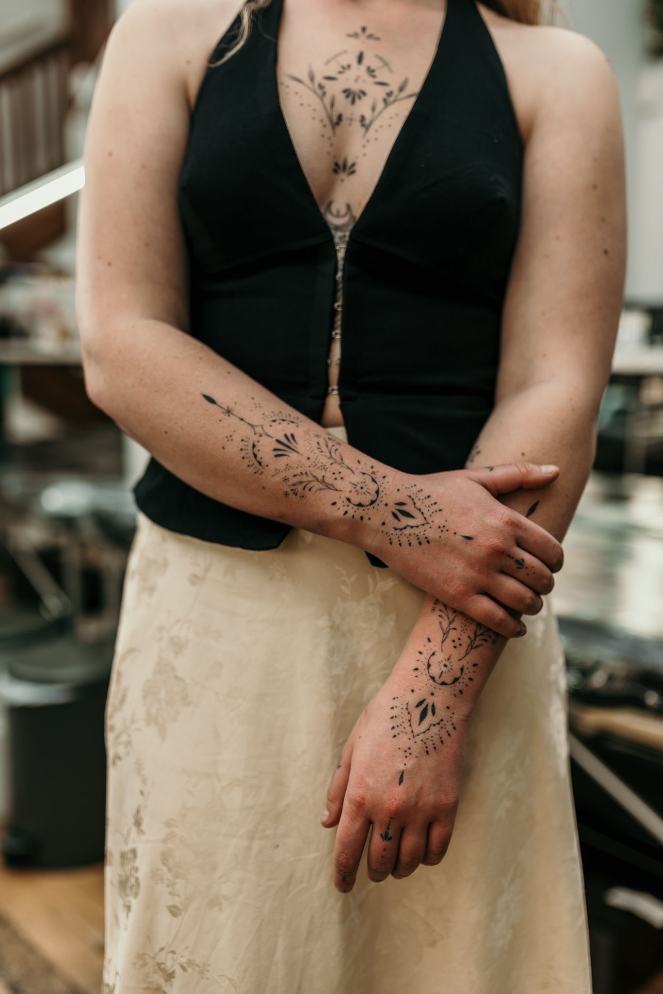 Close-up of intricate floral arm tattoo in Christchurch.