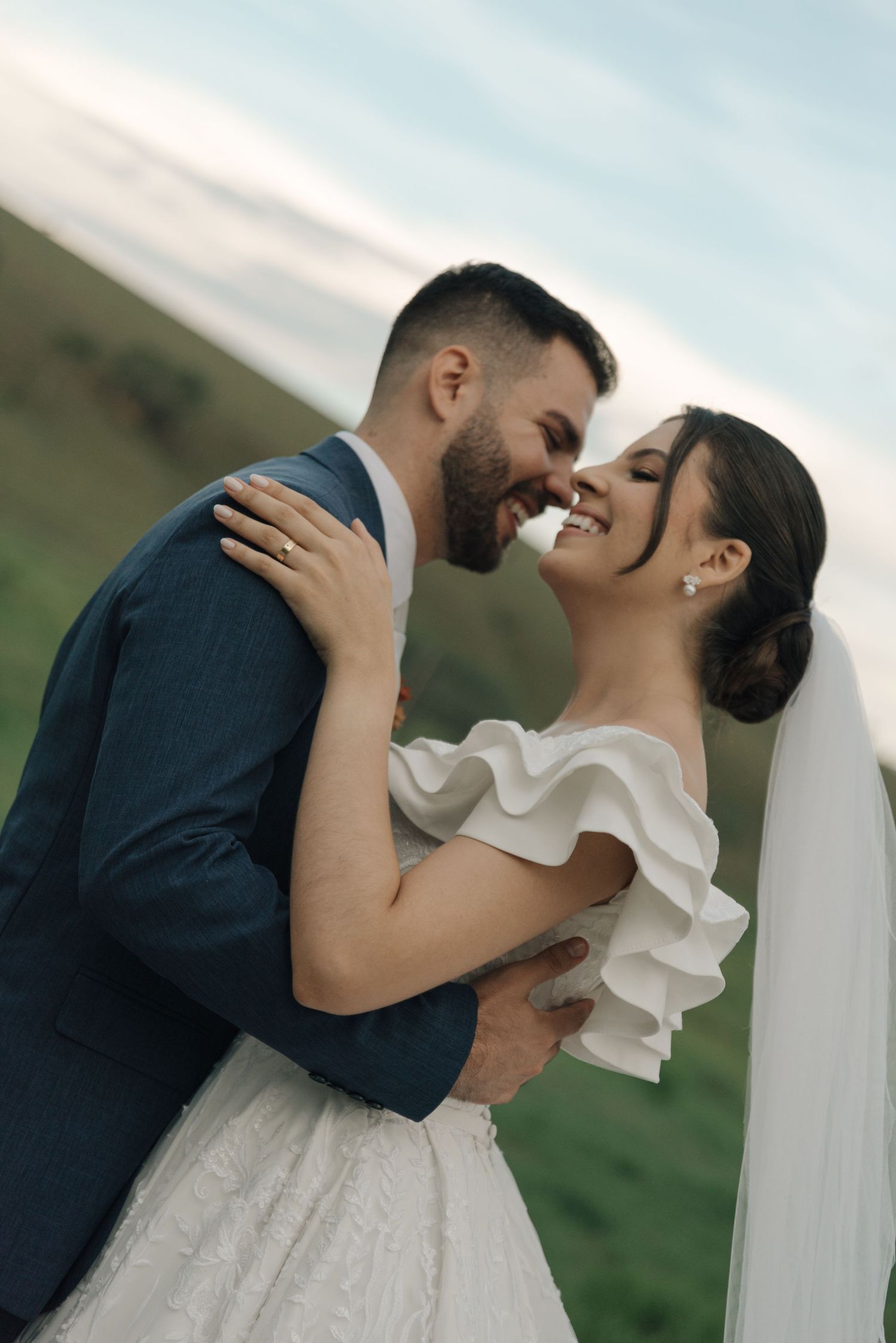 An intimate moment between newlyweds showing genuine joy and laughter.