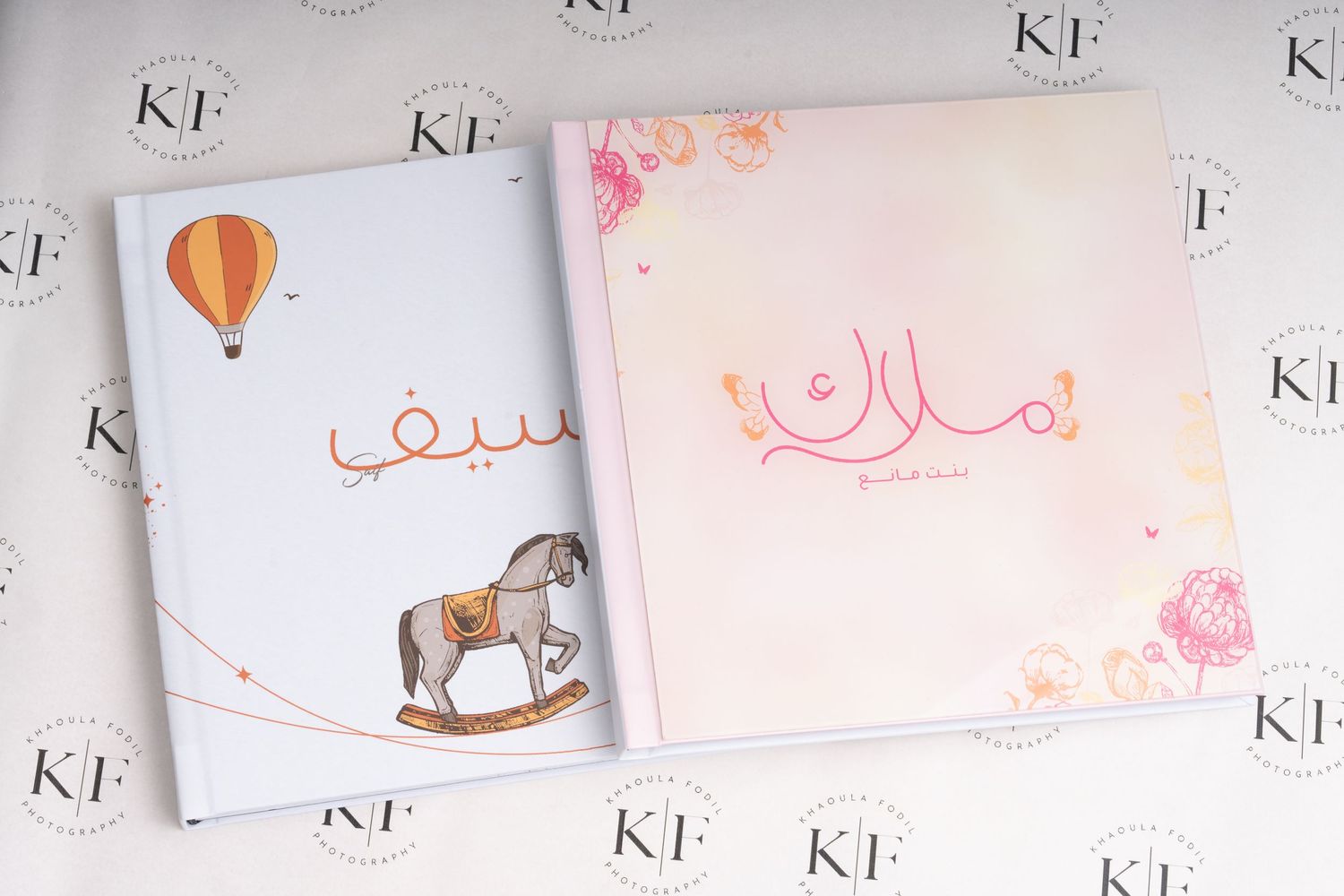 White stationery set with delicate hot air balloon and rocking horse motifs in soft colors.