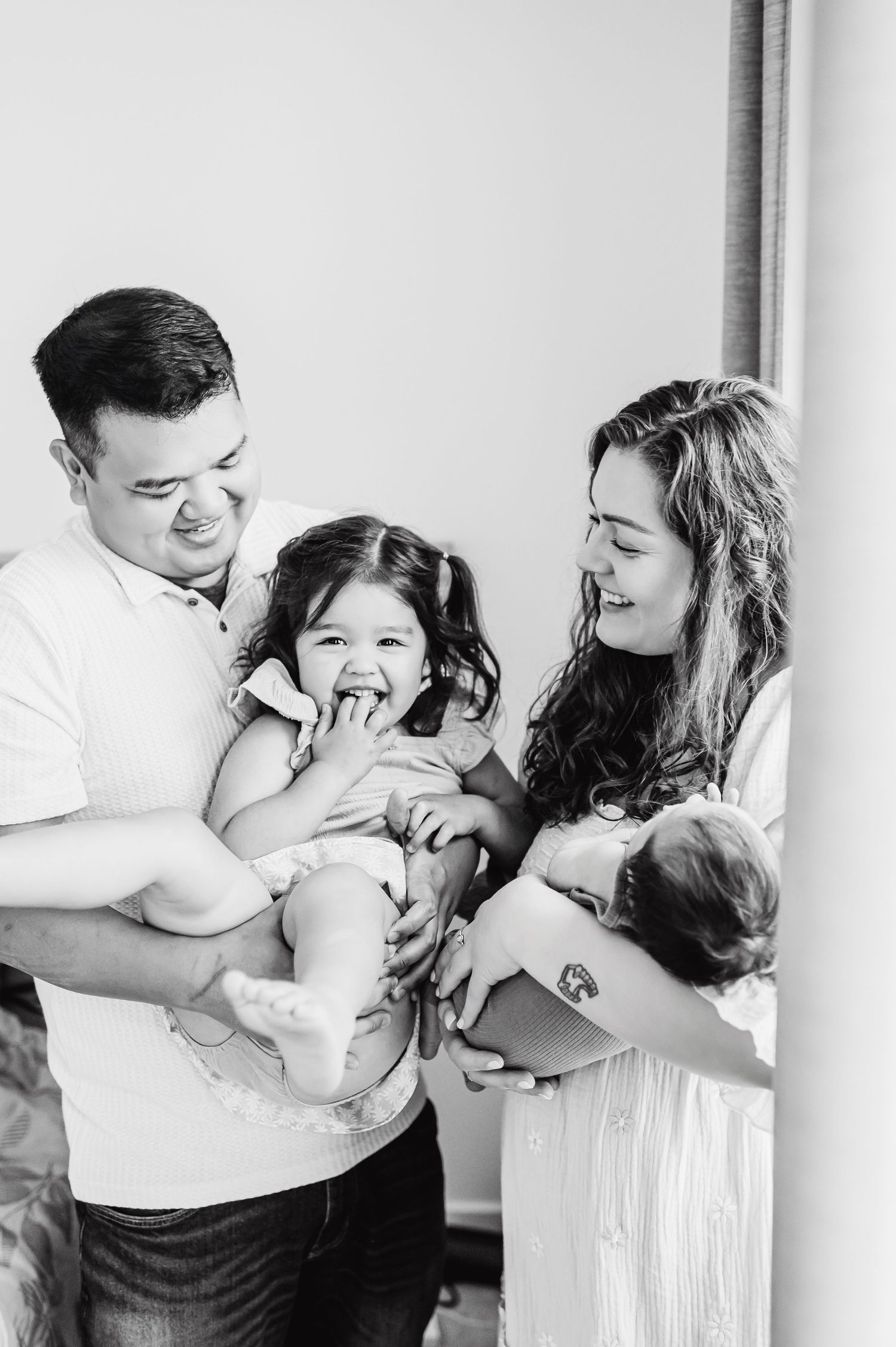 Posed Newborn Photographer based in Denver Colorado offering in Studio Newborn Photo sessions. Centennial Colorado photography studio