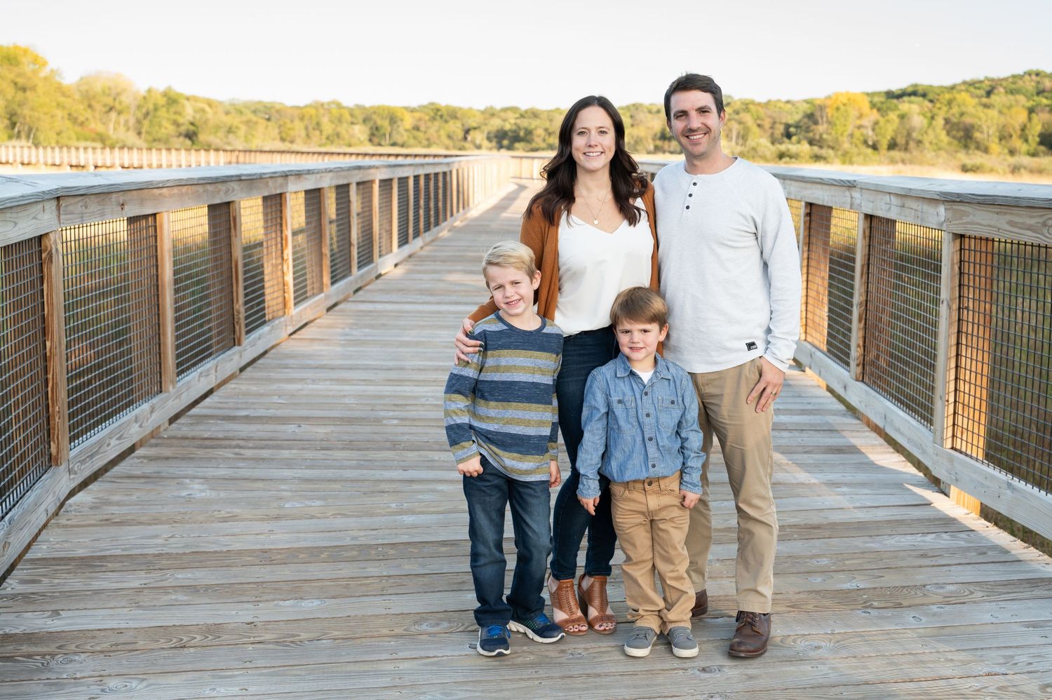 family on boardwalk
