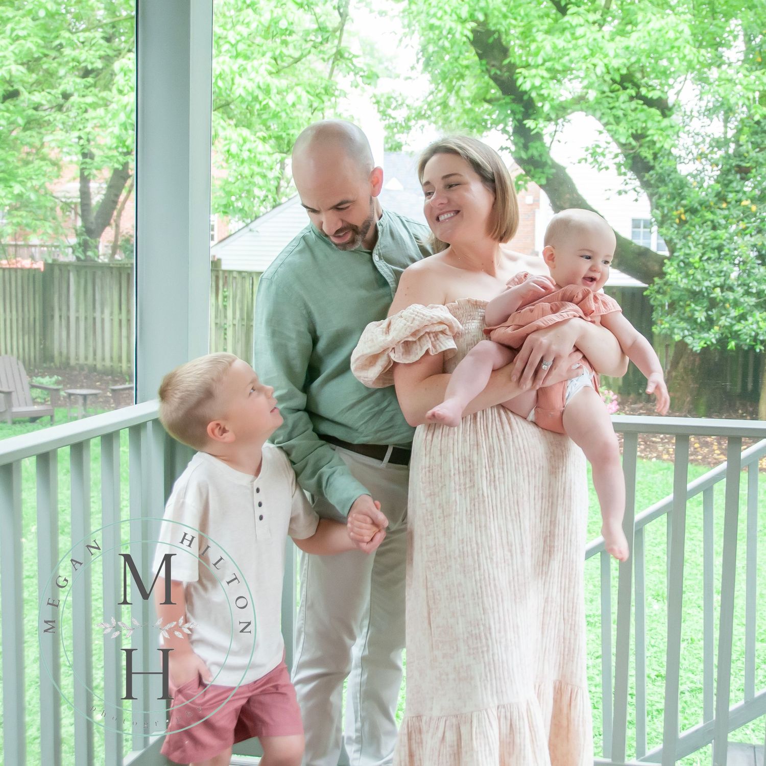 Family picture on porch candid pose