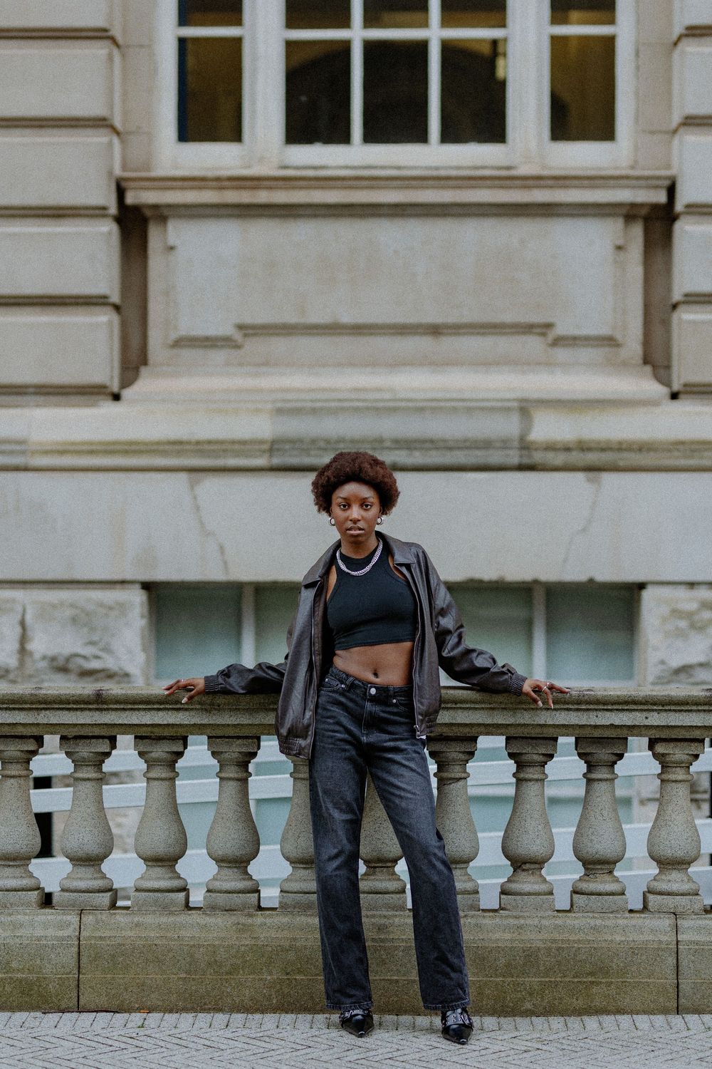 Artistic photo series showing figure leaning on white stone balustrade against classical building facade.