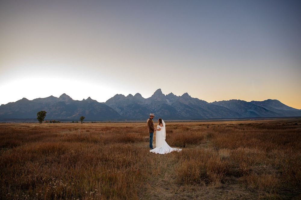 Elopement couples enjoys the lanndscape of Grand Teton National Park