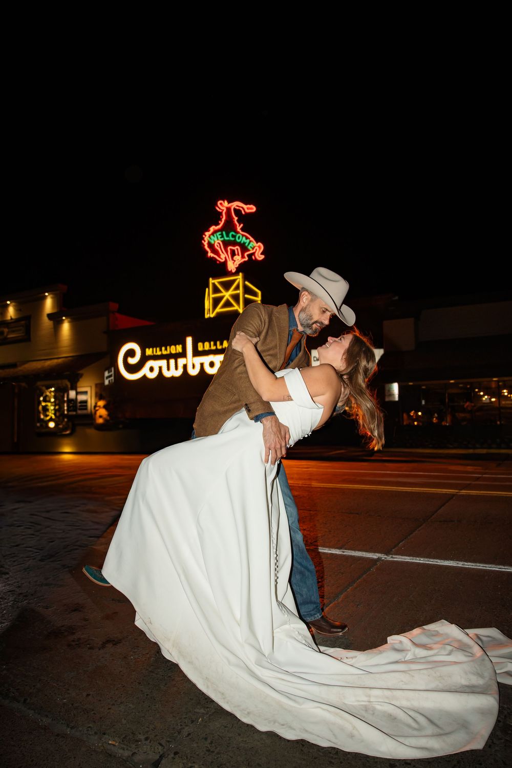 Bride and groom share a celebratory dance in downtown Jackson, Wyoming