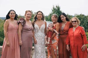 A family and bride photo taken at a wedding, photographed by Hudson Valley based photographer, Sasha Pierre-Louis