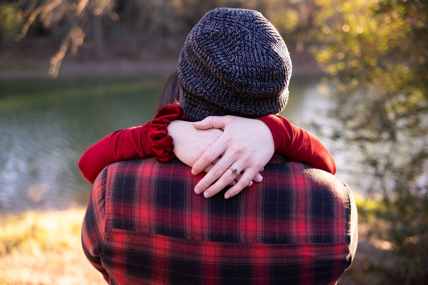 Engagement Photo Session of a couple during Golden Hour in the woods near the lake at Kickerillo-Mischer Preserve