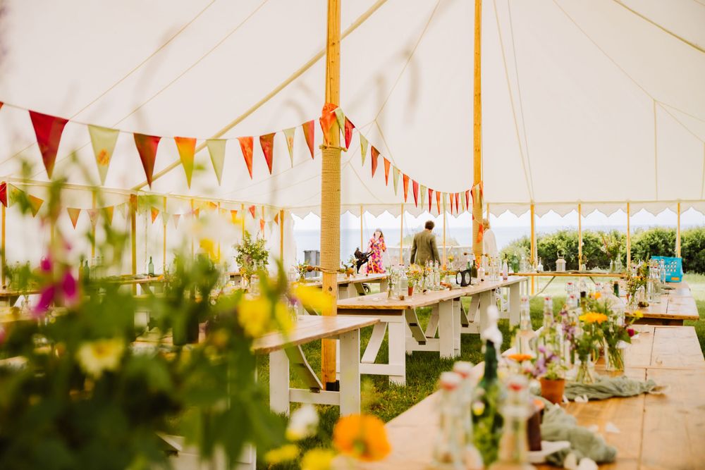Picture of Taddle Farm Tents.  wedding Marquee boho floral rustic decorations in Dorset at West Bexington near Bridport and Abbotsbury