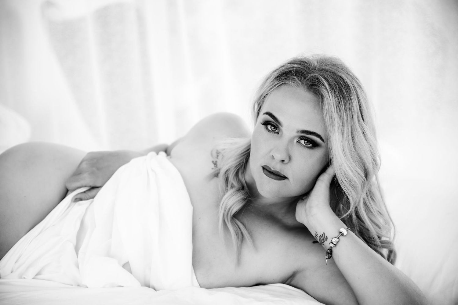 An intimate black and white portrait of a tender moment.