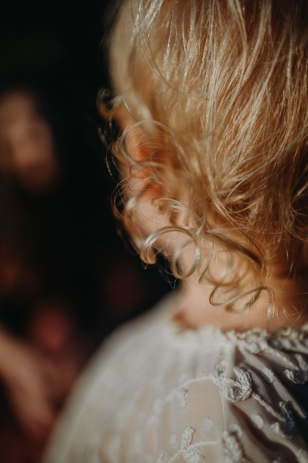 a close up of a little girl's golden curl from a photo session with Forever Ours Photography in Kent