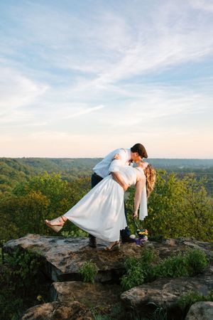 A couple pose for their engagement session at Caney Ridge Ranch in Claremore, Oklahoma.
