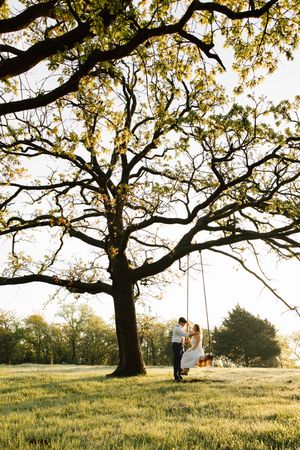 A couple pose for their engagement session at Caney Ridge Ranch in Claremore, Oklahoma.