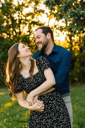 A couple pose for their engagement session at Caney Ridge Ranch in Claremore, Oklahoma.