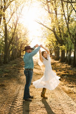 A couple pose for their engagement session at Caney Ridge Ranch in Claremore, Oklahoma.