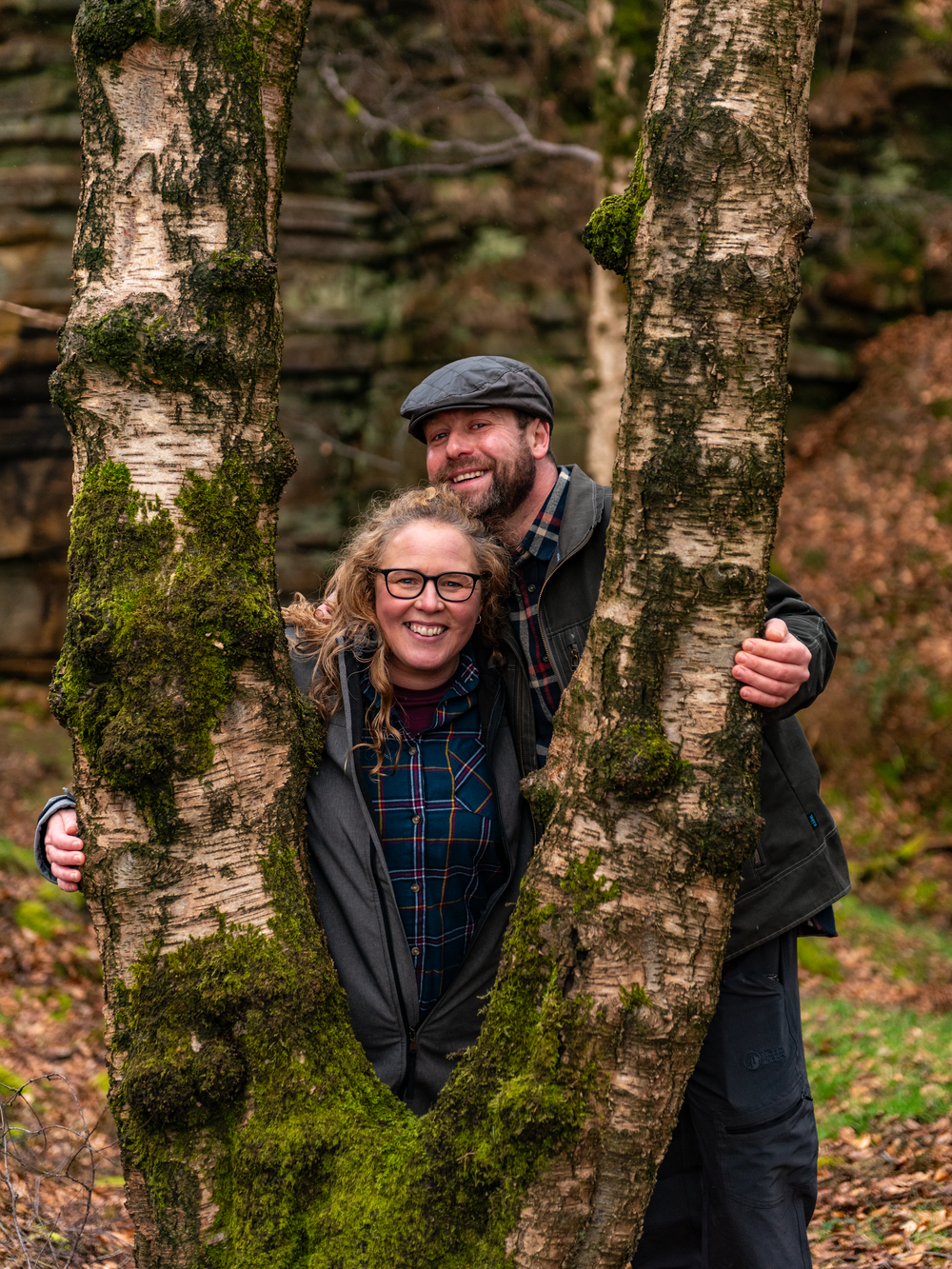 posing with a tree