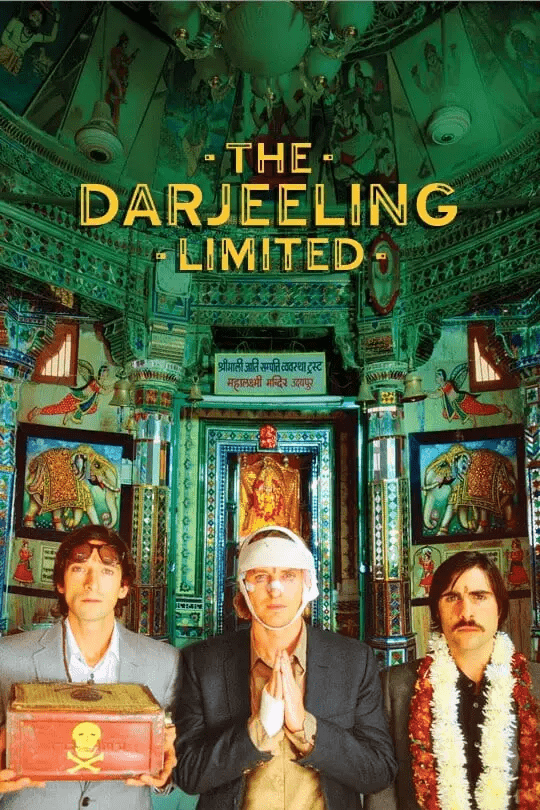 A green-tinted scene from The Darjeeling Limited showing travelers in an ornate train car interior.