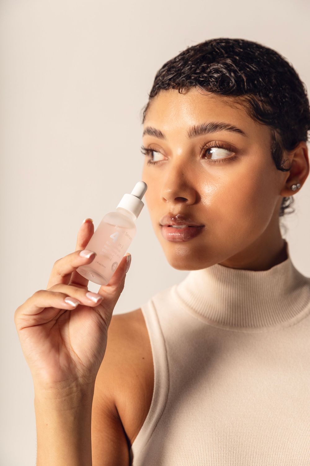 A series of four beauty shots showing someone applying a nasal strip against a neutral beige background.