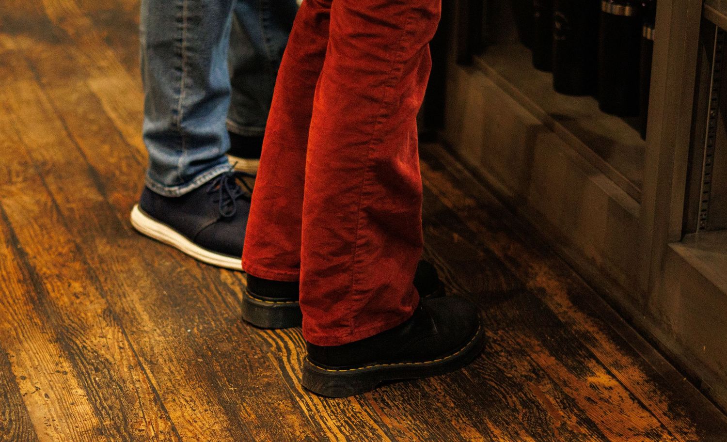 a picture of two sets of feet standing close together