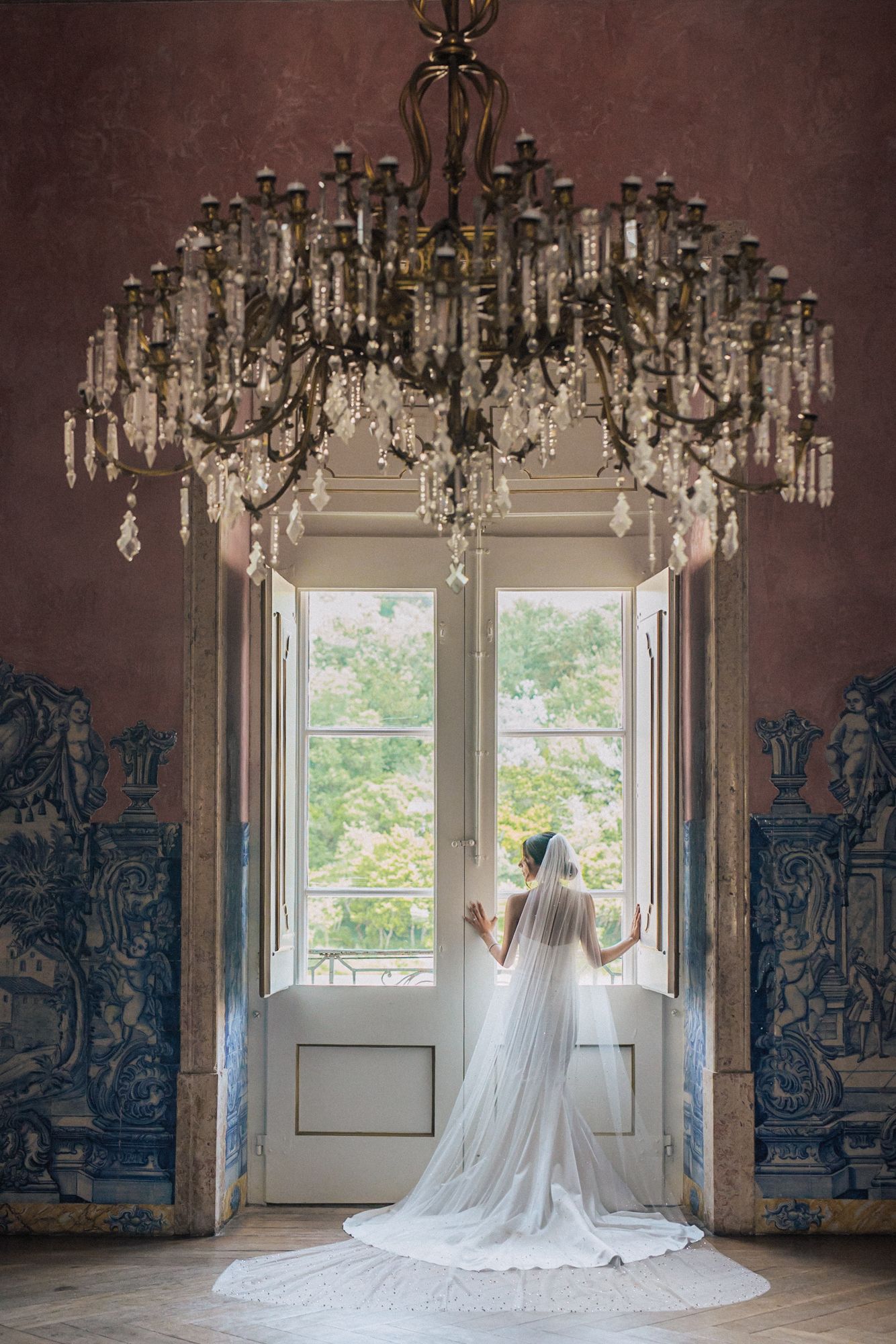 indian bride in white dress photographed by an Indian destination wedding photographer in Portugal – Correio Mor Palace