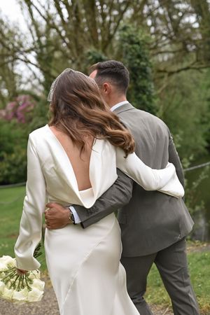 married couple walking away after elopement ceremony in Ireland