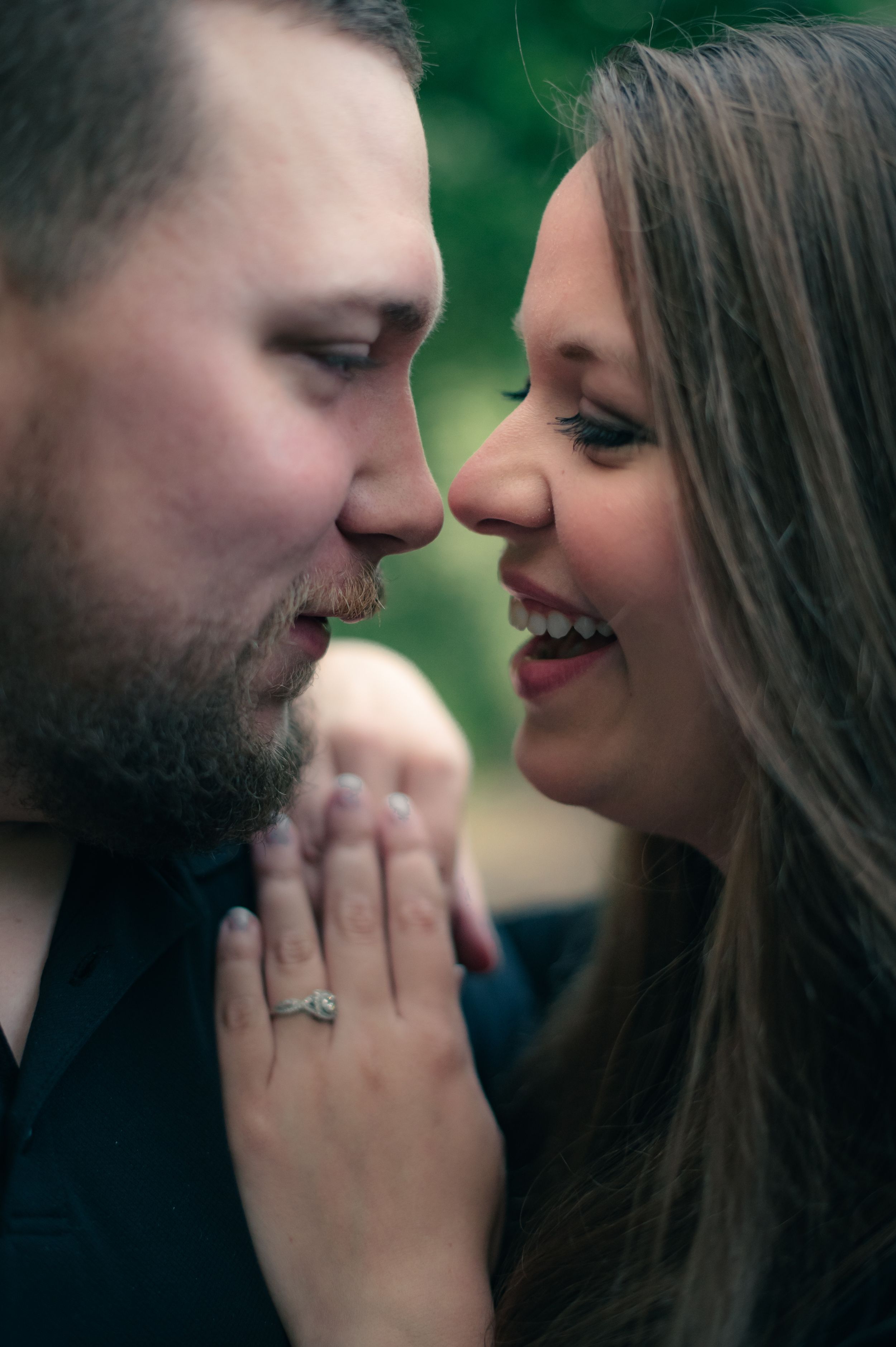 married couple looking at each other with love and smiles on they trip to Irish castle