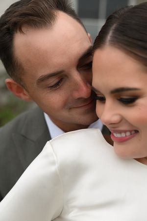 married couple hugging each other in love after elopement ceremony in Ireland